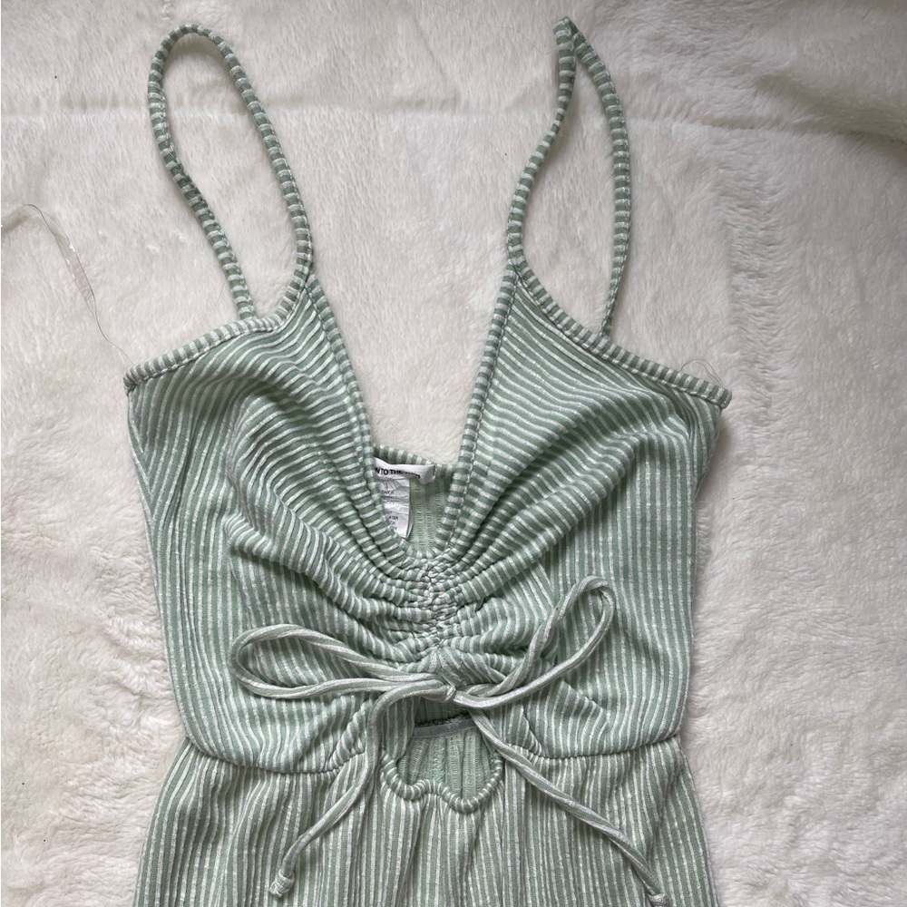 Green and white striped jumper